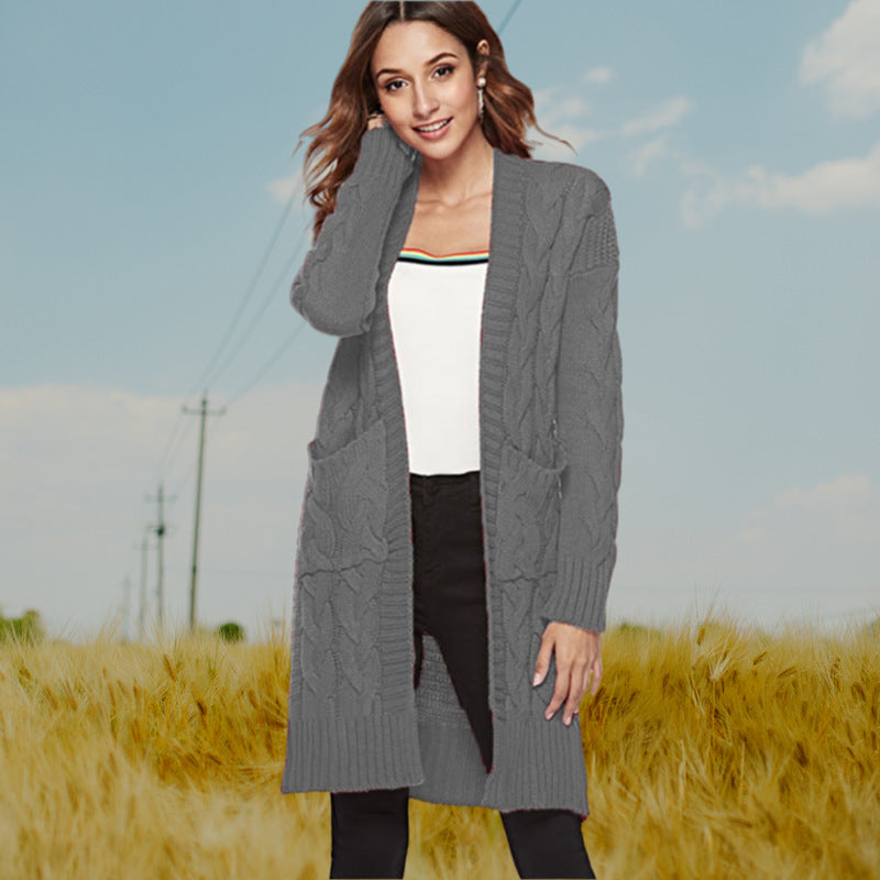 Cardigan en gros tricot pour femmes avec un élégant design en torsade et des poches pratiques Chic und Stil
