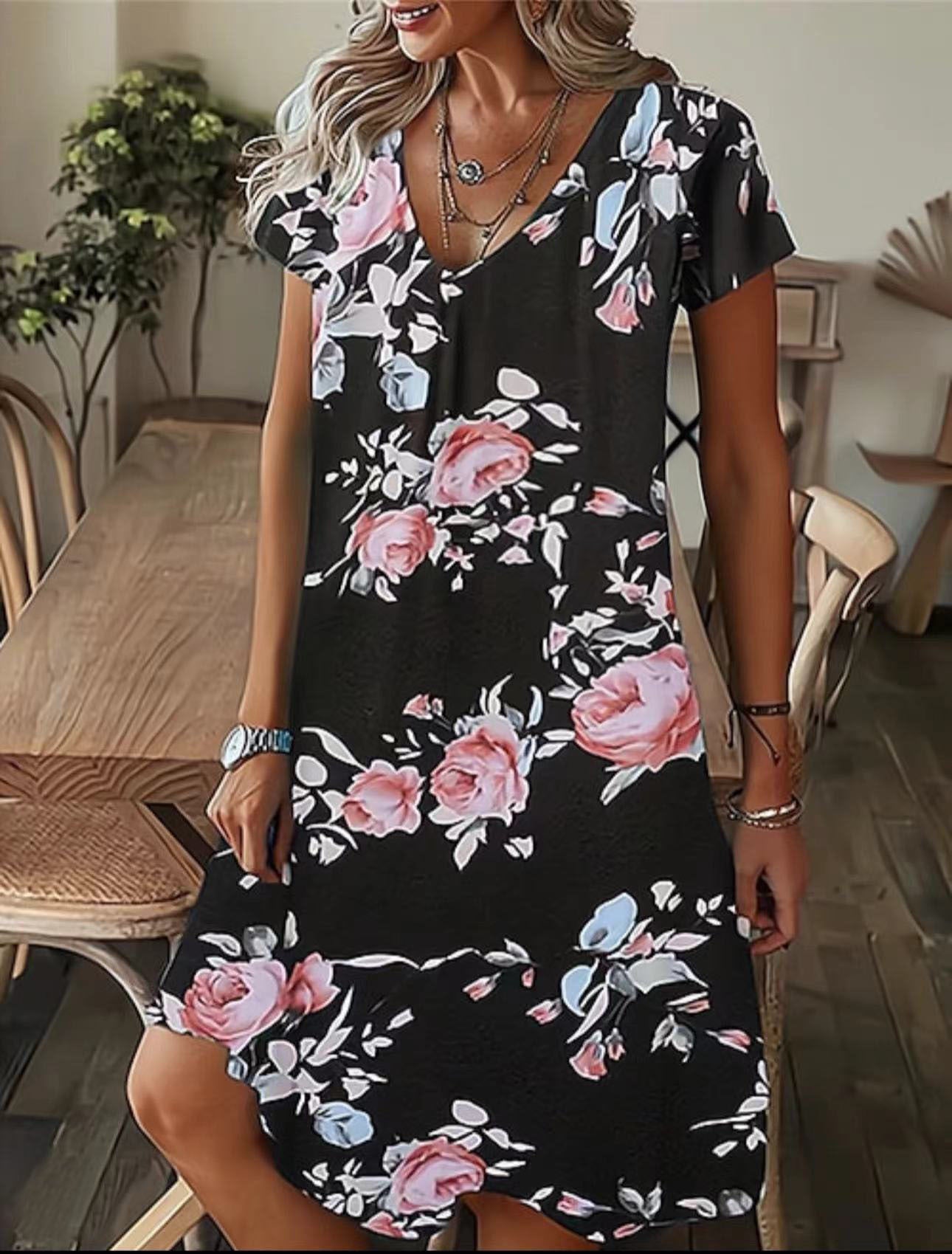 Robe midi à décolleté en V fluide pour femmes avec motif abstrait Chic und Stil