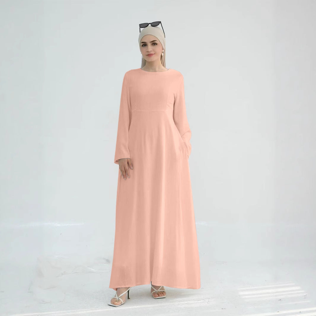 Robe maxi élégante pour dames avec des manches longues et des poches latérales Chic und Stil