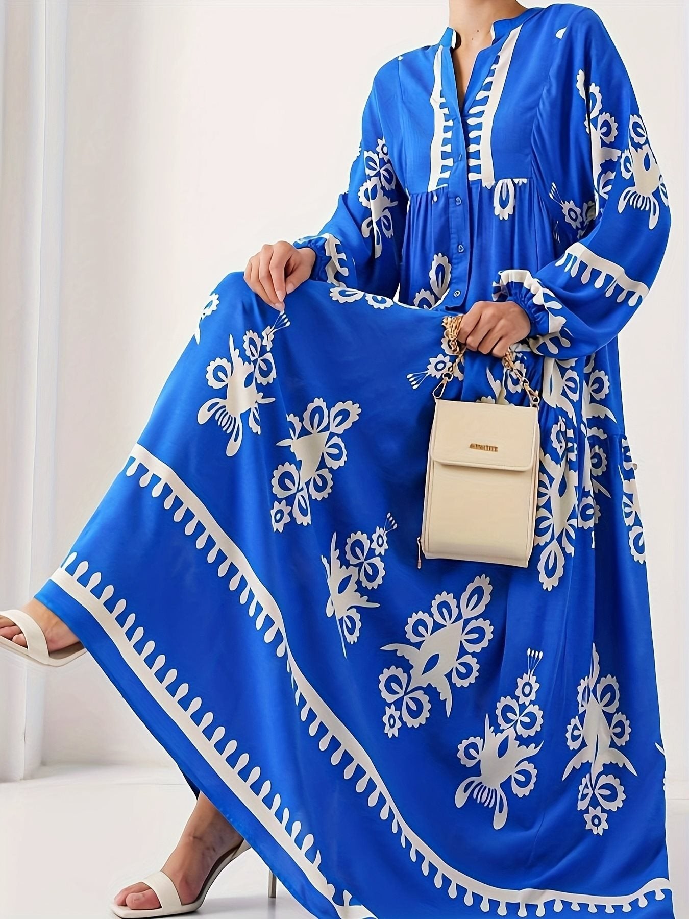 Robe longue kaftan pour femmes avec accents floraux et boutons Chic und Stil