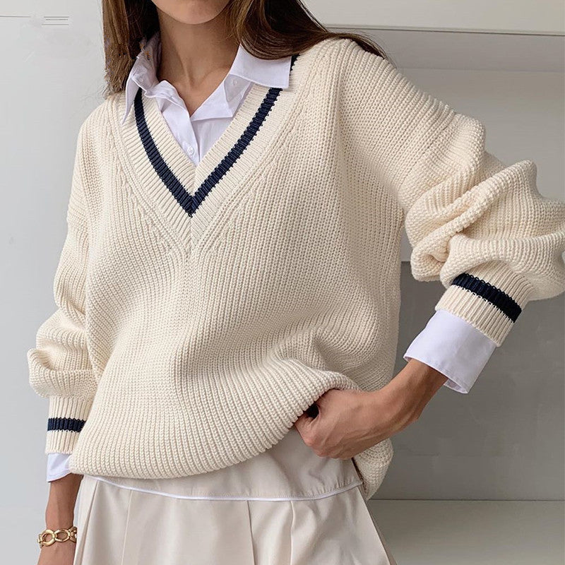 Pull femme tendance à encolure en V avec manches bouffantes et tissu texturé Chic und Stil