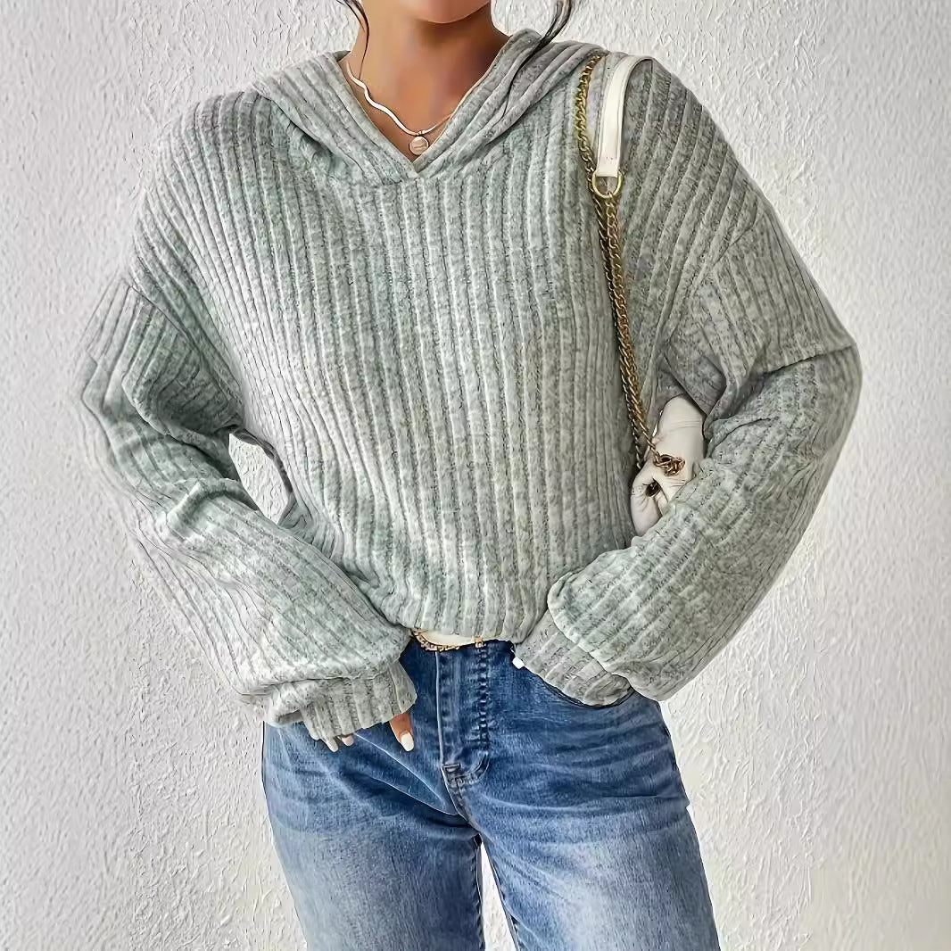 Pull décontracté pour femmes avec design en rib côtelé texturé et col à capuche confortable Chic und Stil