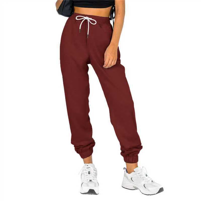 Pantalon d'entraînement pour femme avec taille élastique et coupe décontractée Chic und Stil