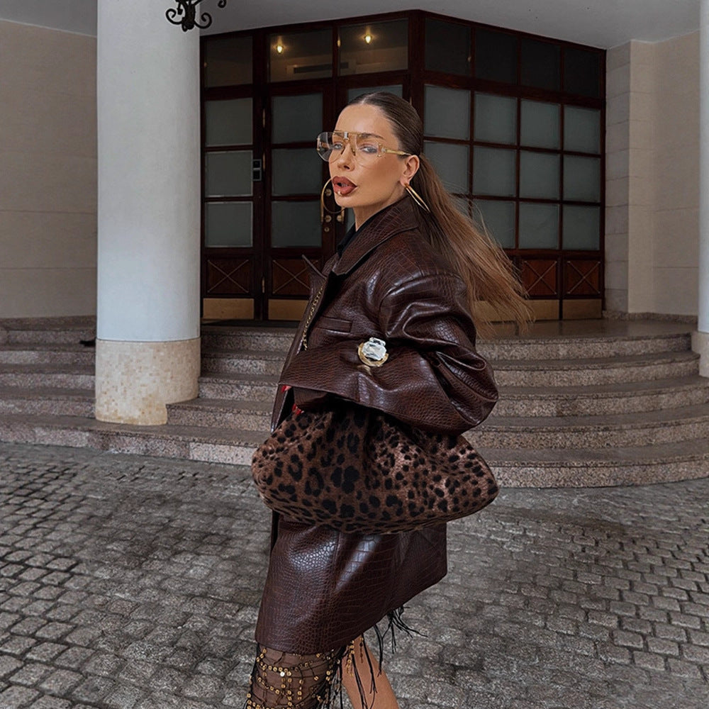 Blazer en simili cuir à la mode pour femmes avec effet croco Chic und Stil