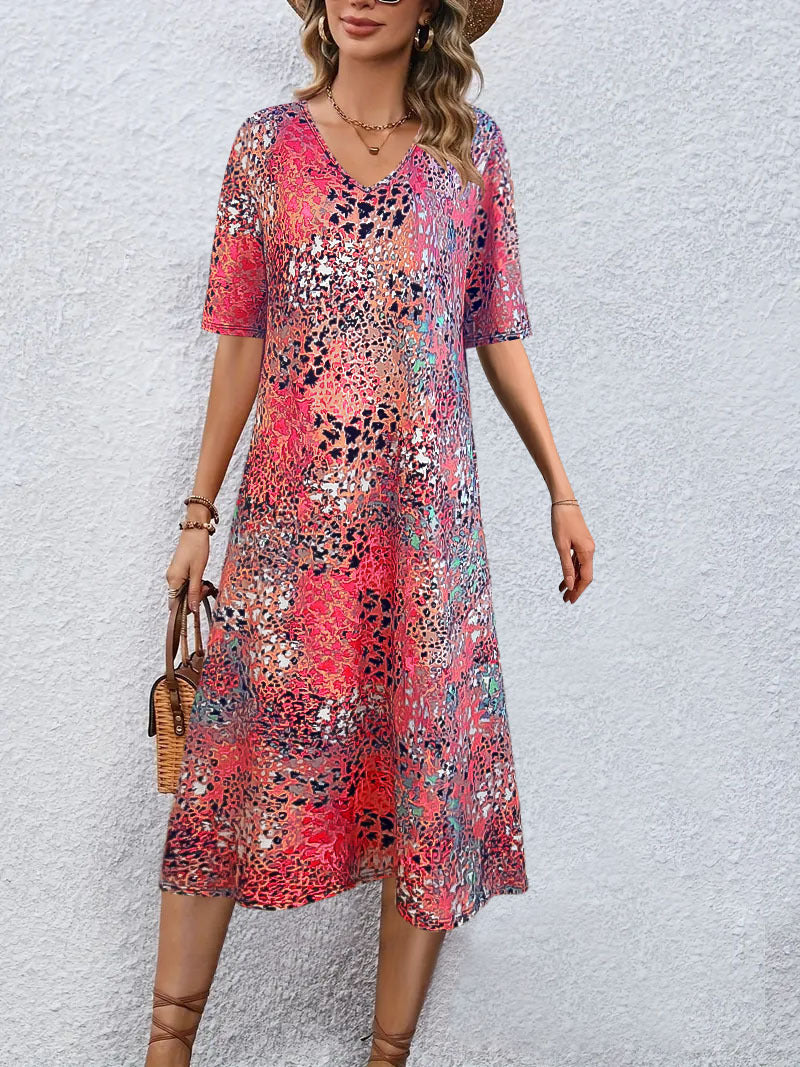 Robe midi fluide pour femmes avec des motifs abstraits accrocheurs Chic und Stil