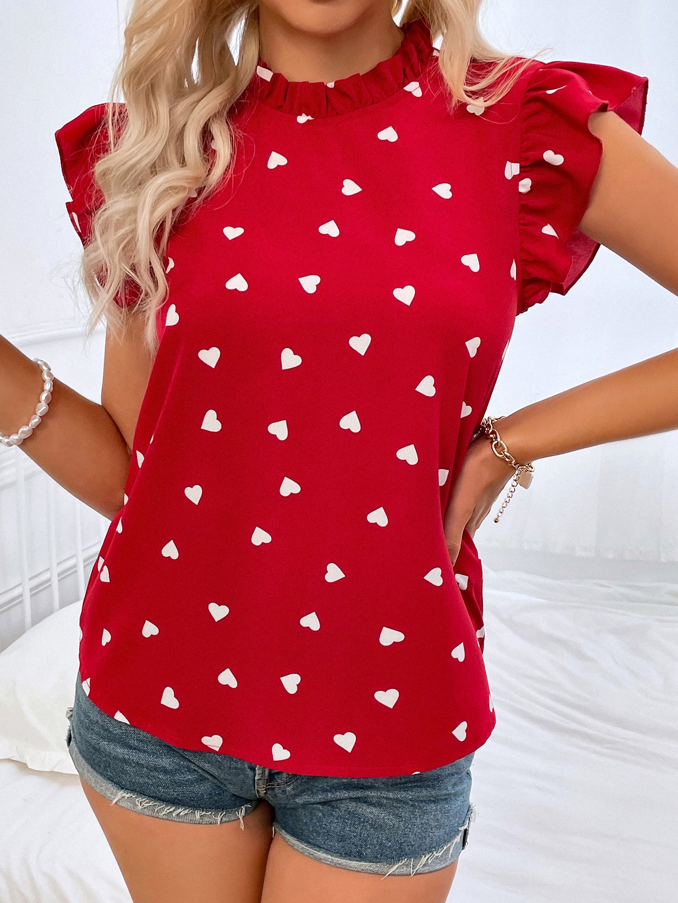 Blouse pour femmes avec motif en cœur et manches à volants Chic und Stil