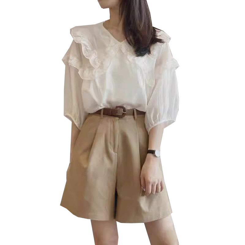 Elegant ruffled blouse set and fitted shorts Chic and Style