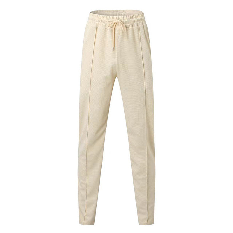 Pantalon de jogging sportif pour hommes avec taille élastique et poches zippées Chic und Stil