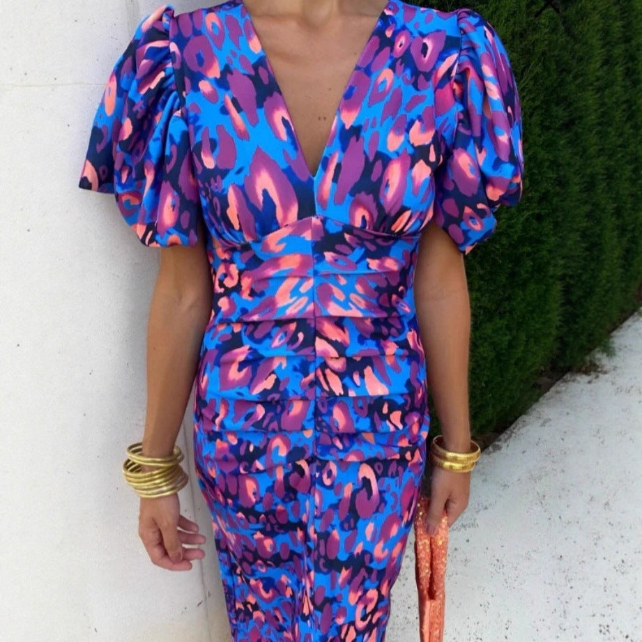 Robe midi femme avec des manches bouffantes excitantes et un décolleté en V profond Chic und Stil