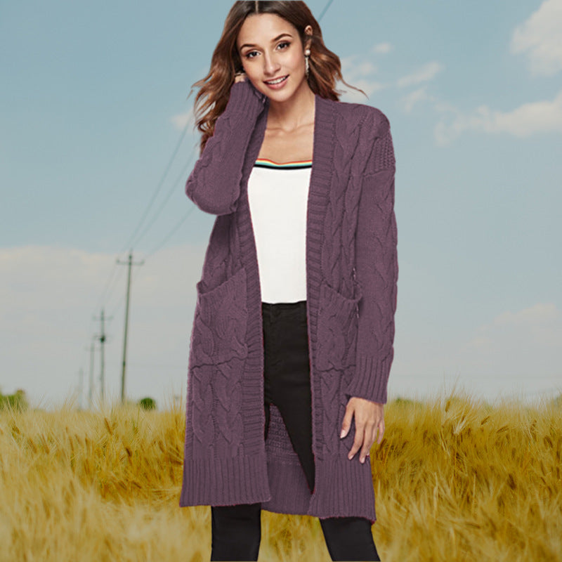 Cardigan en gros tricot pour femmes avec un élégant design en torsade et des poches pratiques Chic und Stil