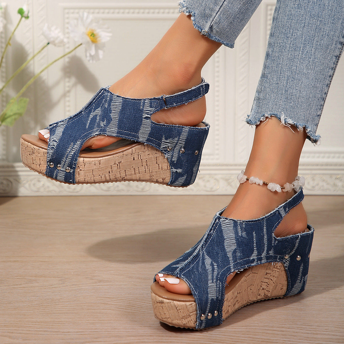 Women's heeled sandals with a trendy denim look featuring a chic and stylish elastic insole design