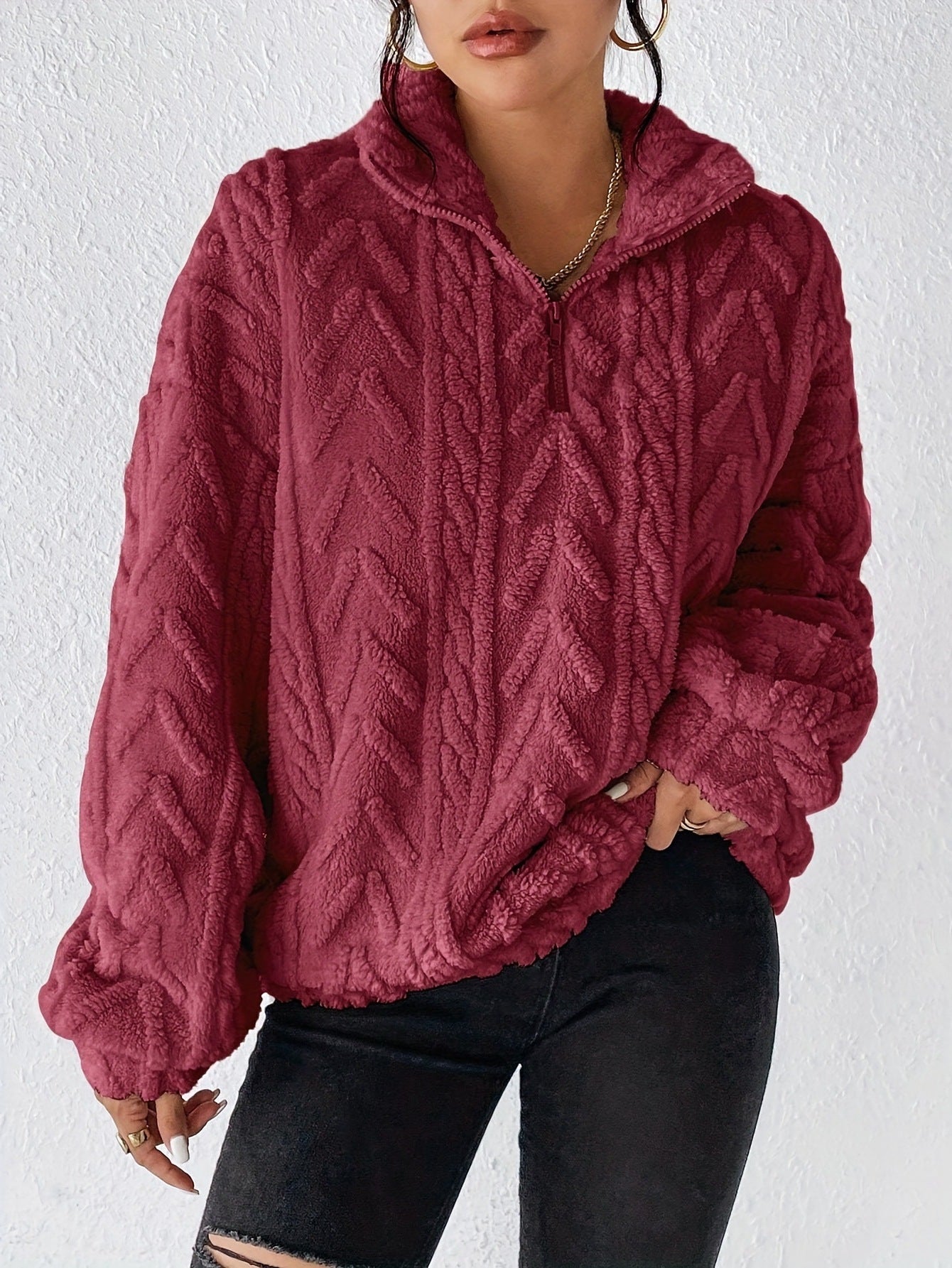 Pull femme en polaire avec col haut et design structuré Chic und Stil