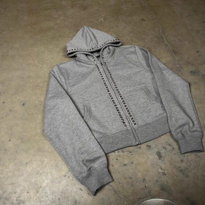 Dame hoodie avec des clous décoratifs et coupe droite Chic und Stil