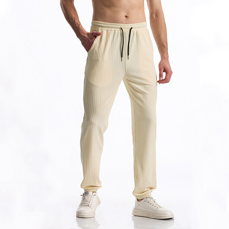 Comfortable sports pants for men with elastic waistband and chic striped design