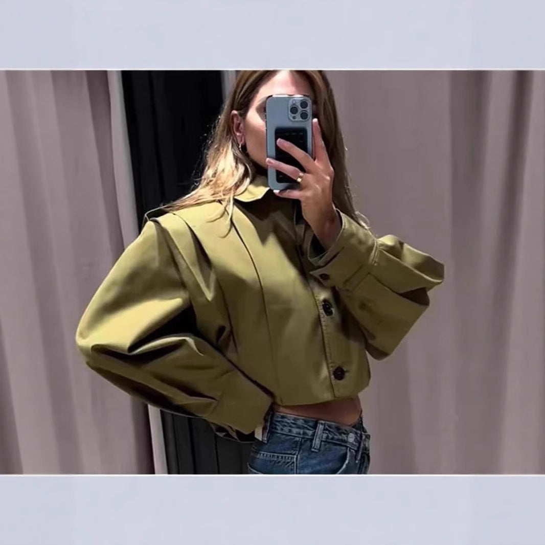 Blouse cintrée féminine à détails de boutons continus Chic und Stil