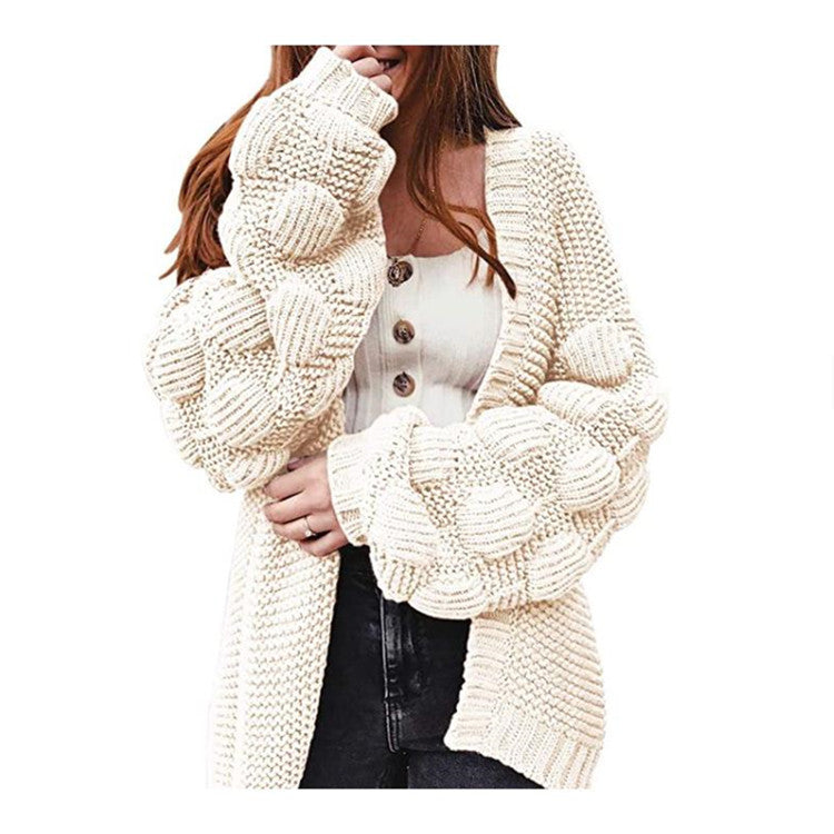 Veste en tricot pour femmes avec des manches bouffantes volumineuses et un aspect de maille structuré Chic und Stil