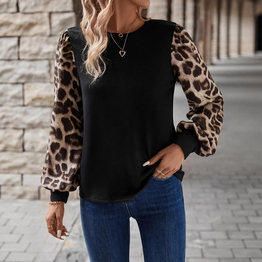 Pull-over pour femmes avec des manches léopard à la mode Chic und Stil