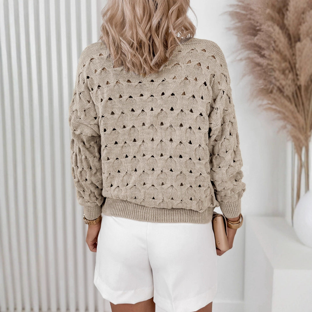 Veste en tricot pour femmes avec une structure en mailles aérées et des détails de boutons élégants Chic und Stil