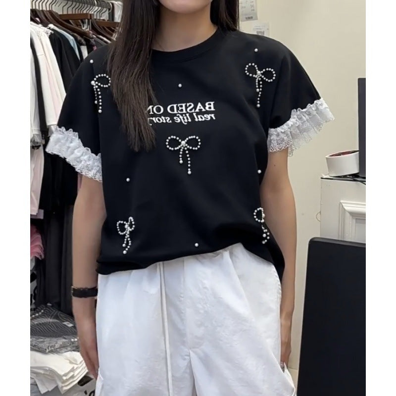 T-shirt graphique décontracté pour femmes avec accents en dentelle Chic und Stil