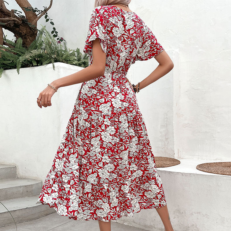 Robe midi à imprimé floral pour femmes avec décolleté en V et manches courtes flottantes Chic und Stil