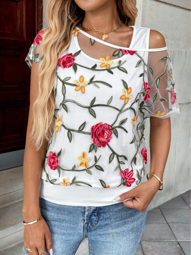 Chemisier femme avec des appliques florales Chic und Stil