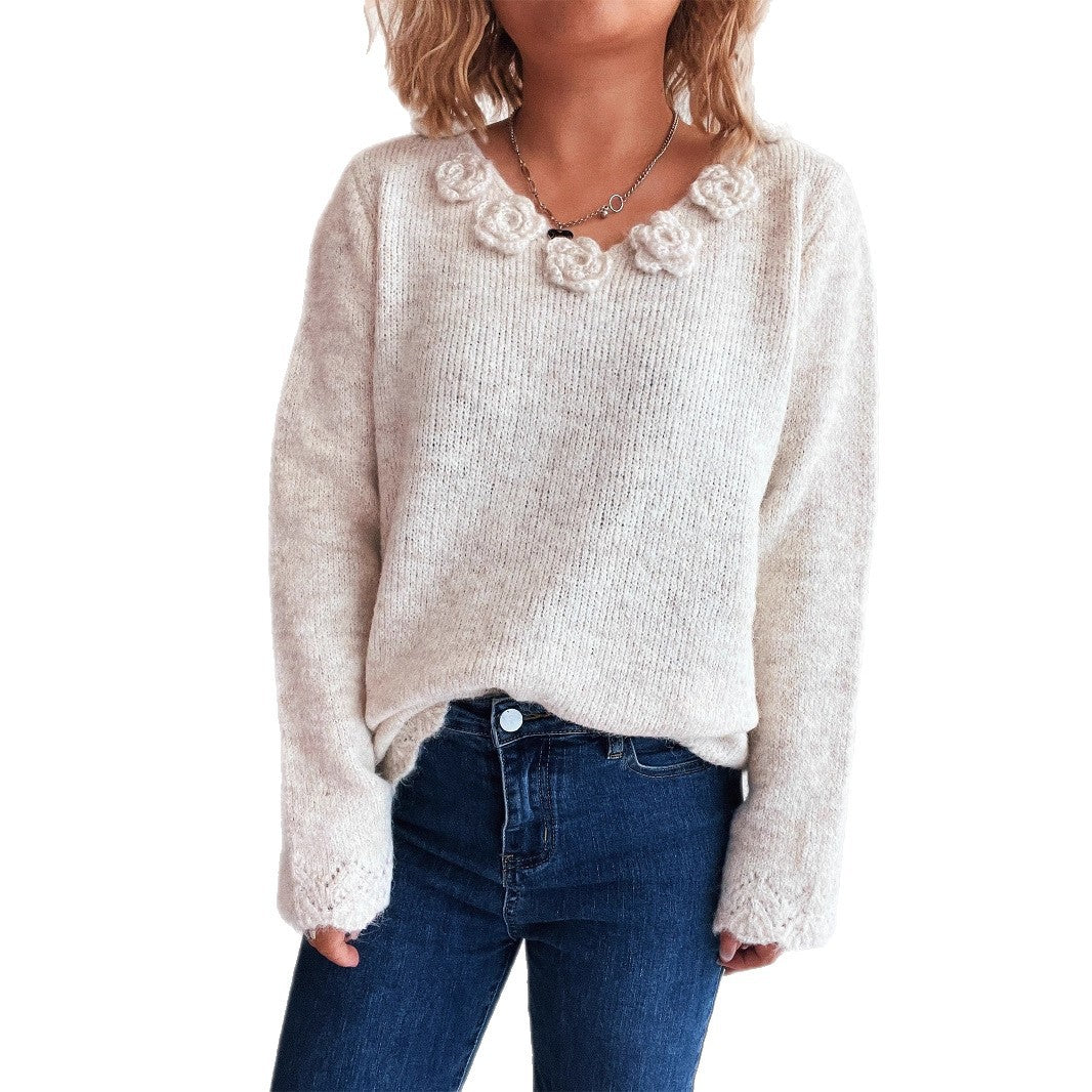 Pull femme avec des applications de roses romantiques et une coupe ample Chic und Stil