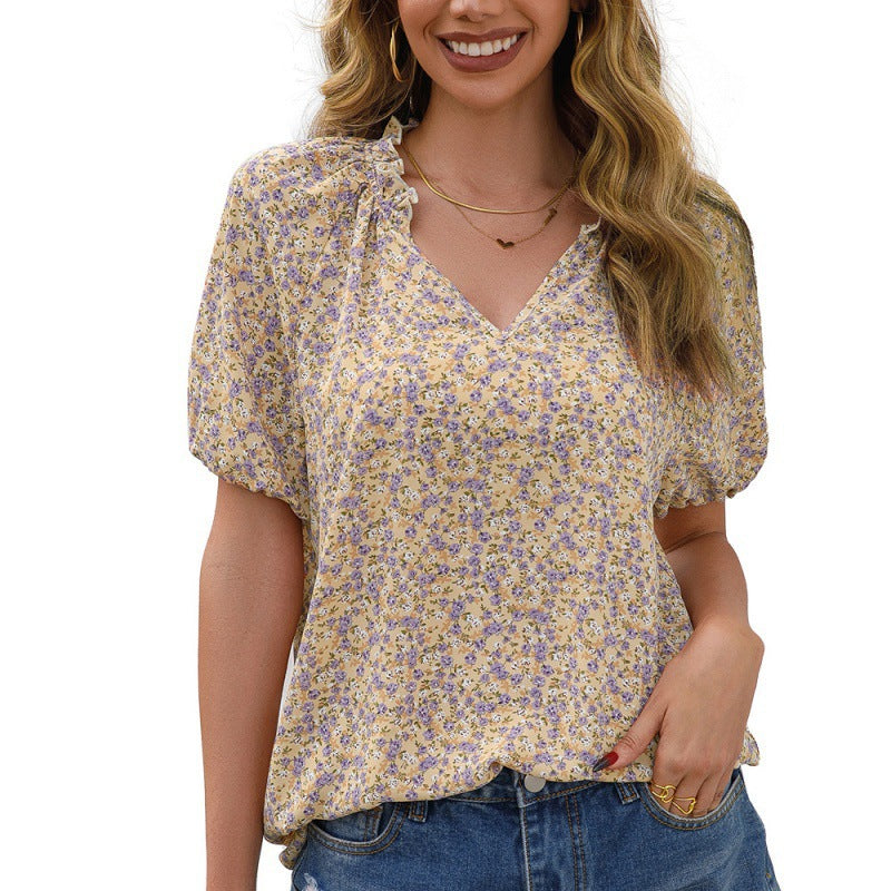Blouse pour dames avec des détails en volants et un motif floral Chic und Stil