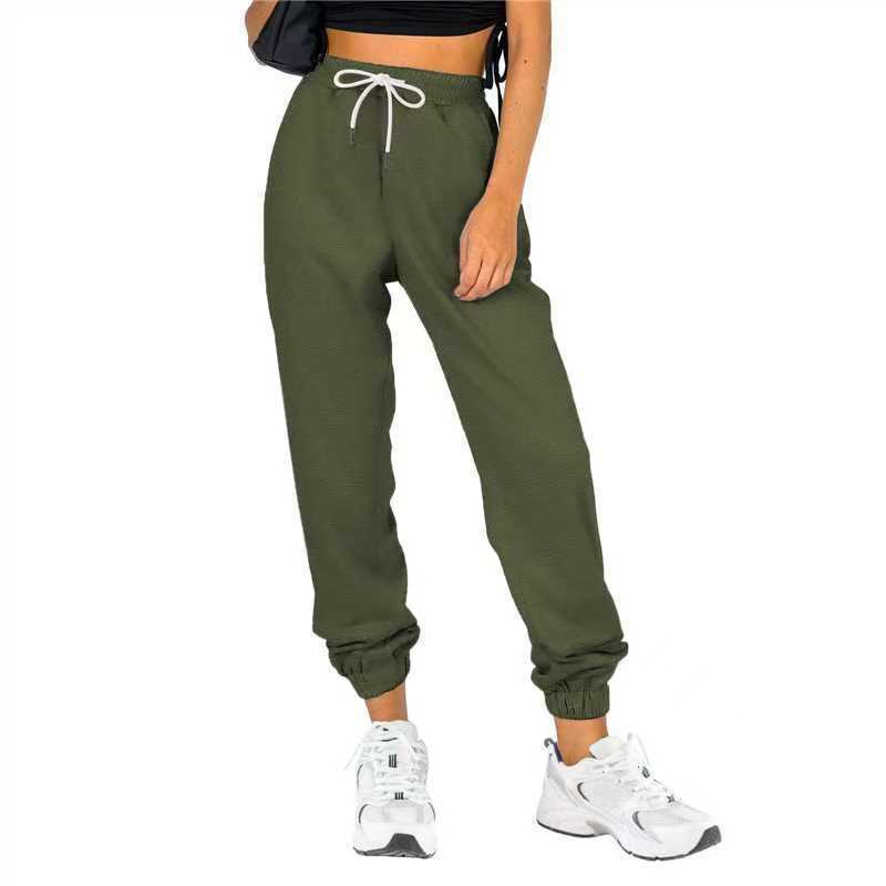 Pantalon d'entraînement pour femme avec taille élastique et coupe décontractée Chic und Stil
