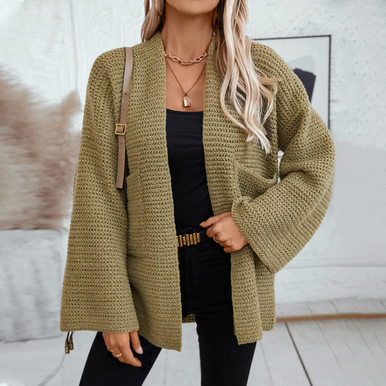 Veste en tricot aérienne pour femmes avec grandes poches et manches ouvertes Chic und Stil