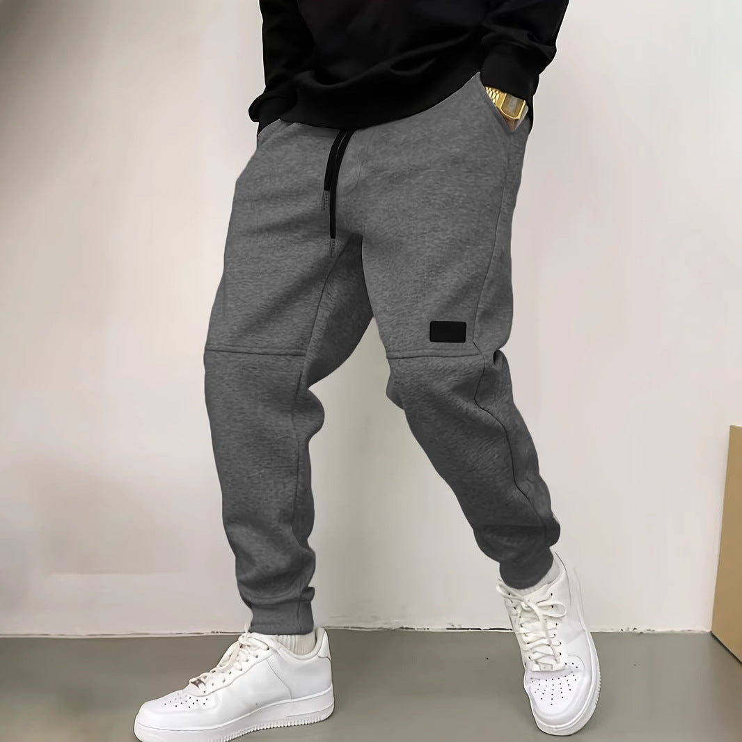 Pantalon de jogging décontracté pour hommes avec taille élastique et poches latérales Chic und Stil