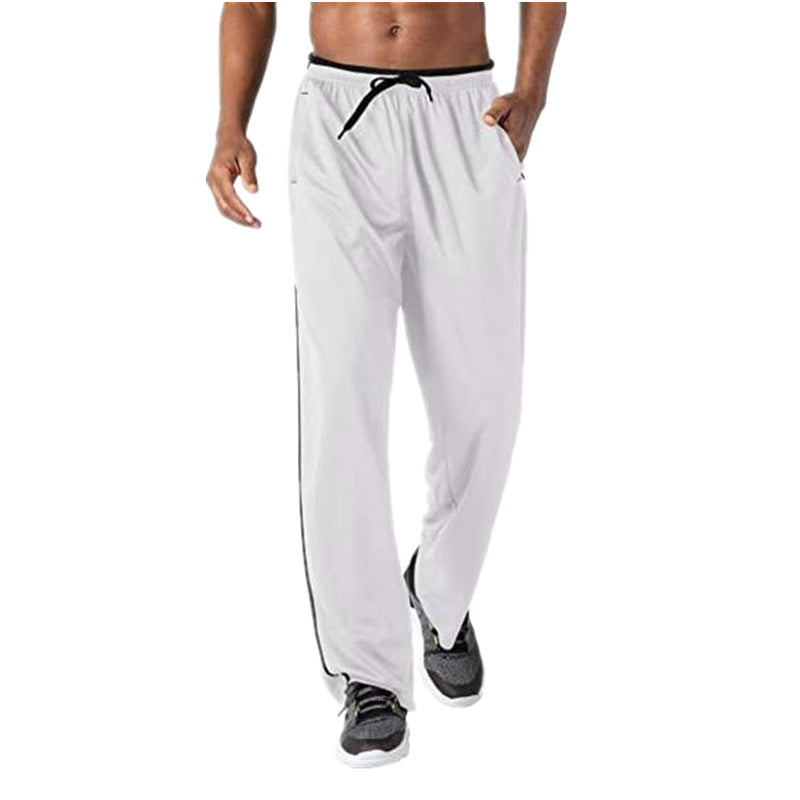 Pantalon d'entraînement sportif pour hommes avec bandes contrastées latérales Chic und Stil