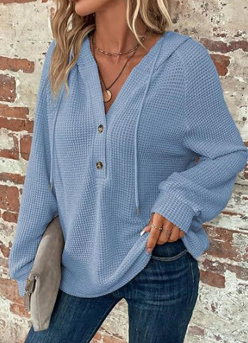 Pull à capuche décontracté pour femmes avec des détails en boutons et un tissu structuré Chic und Stil
