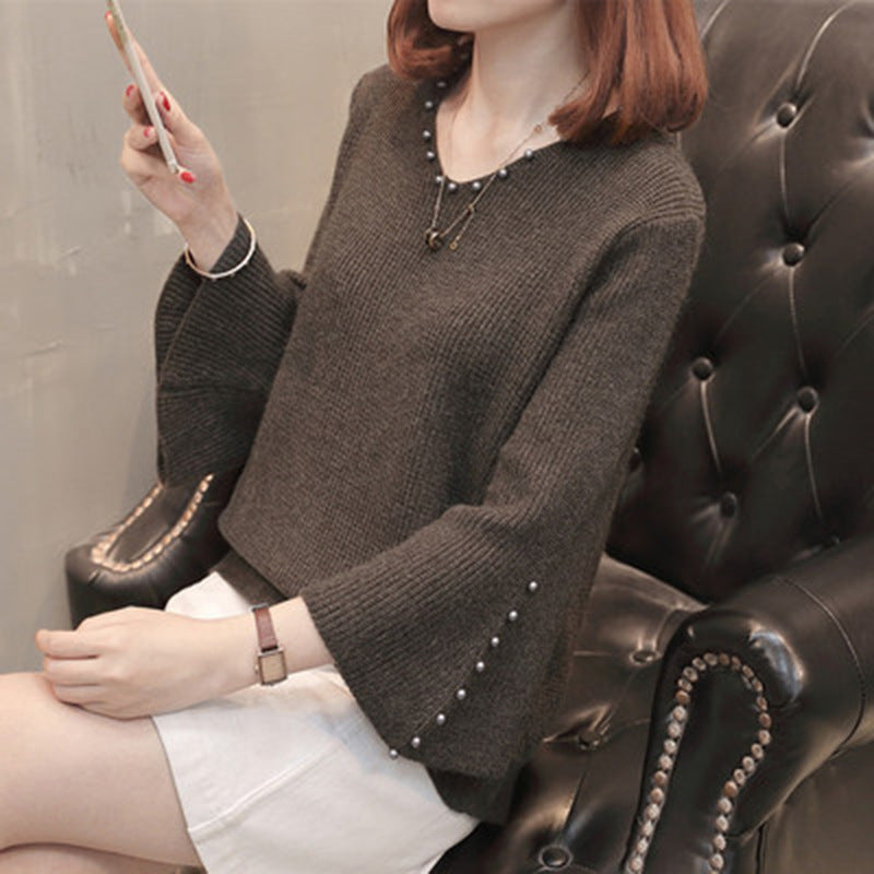 Pull femme avec coupe ample et détails en perles Chic und Stil