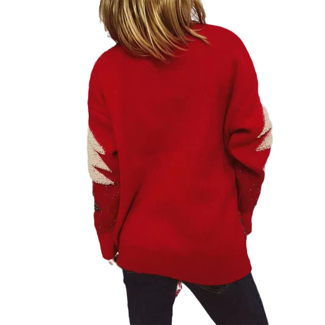 Pull féminin festif avec motif de Noël et appliqués scintillants Chic und Stil