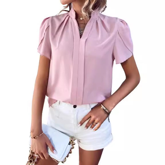 Chemisier pour femmes avec manches bouffantes et élégant boutonnière Chic und Stil