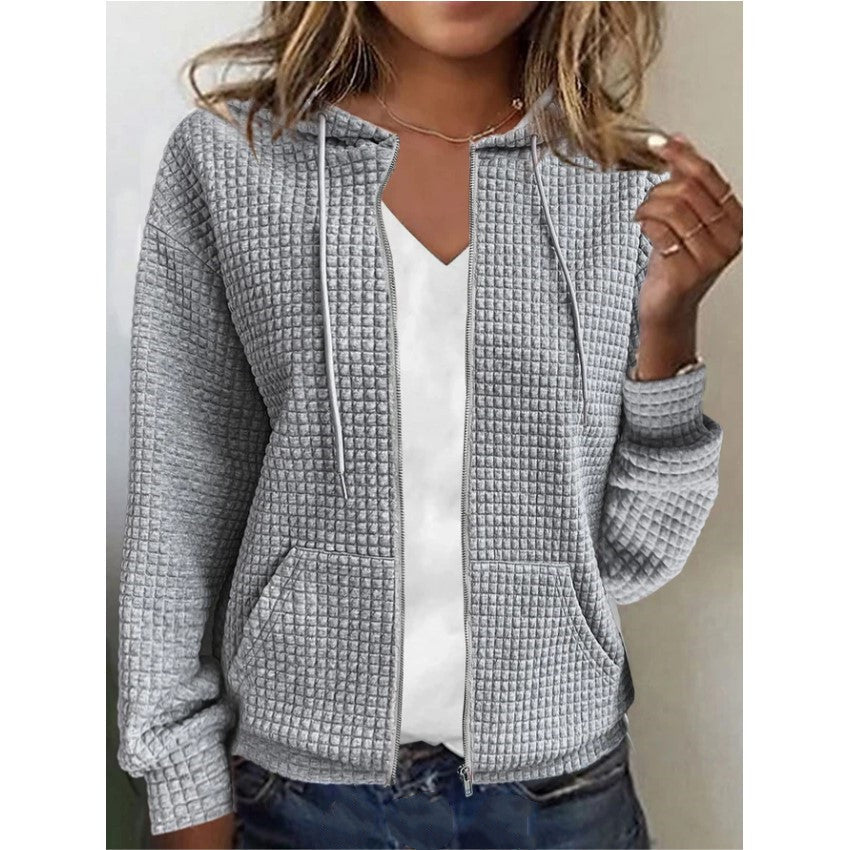 Veste à capuche légère à structure gaufrée pour femmes avec poches pratiques Chic und Stil