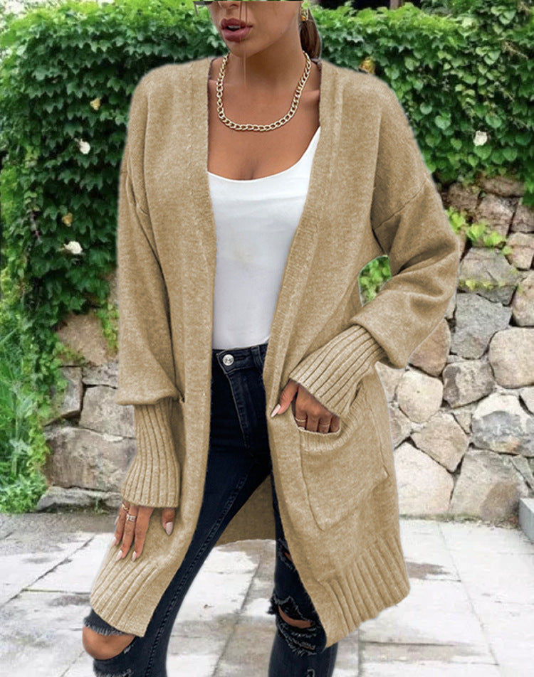 Cardigan en tricot pour femmes avec une coupe décontractée et de grandes poches Chic und Stil