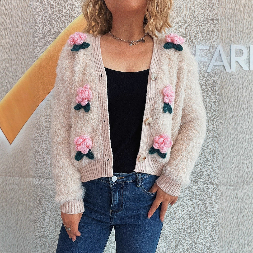 Cardigan femme avec des appliqués floraux et un matériau doux Chic und Stil