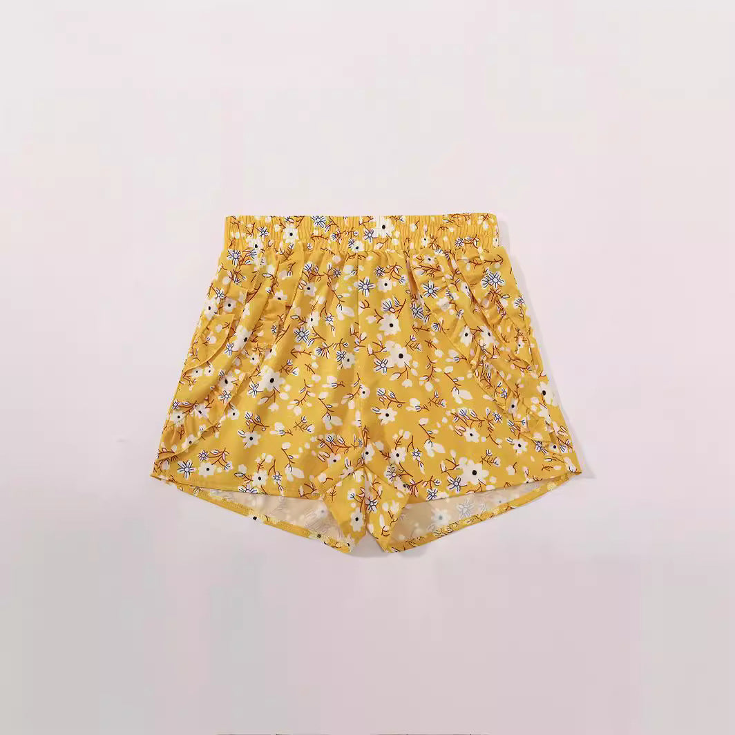 Shorts fleuris pour femmes avec taille élastique et poches latérales Chic und Stil