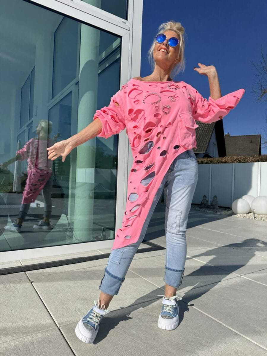 T-shirt oversized pour femmes avec des détails de déchirure tendance et une coupe décontractée Chic und Stil