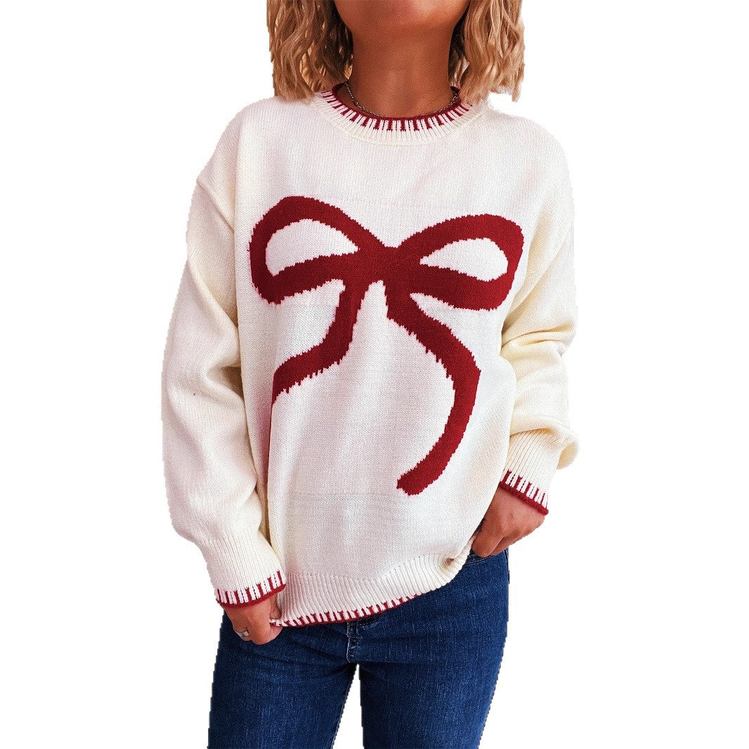 Pull femme en tricot avec motif de nœud ludique et finition élégante Chic und Stil