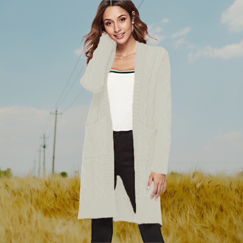 Cardigan en gros tricot pour femmes avec un élégant design en torsade et des poches pratiques Chic und Stil