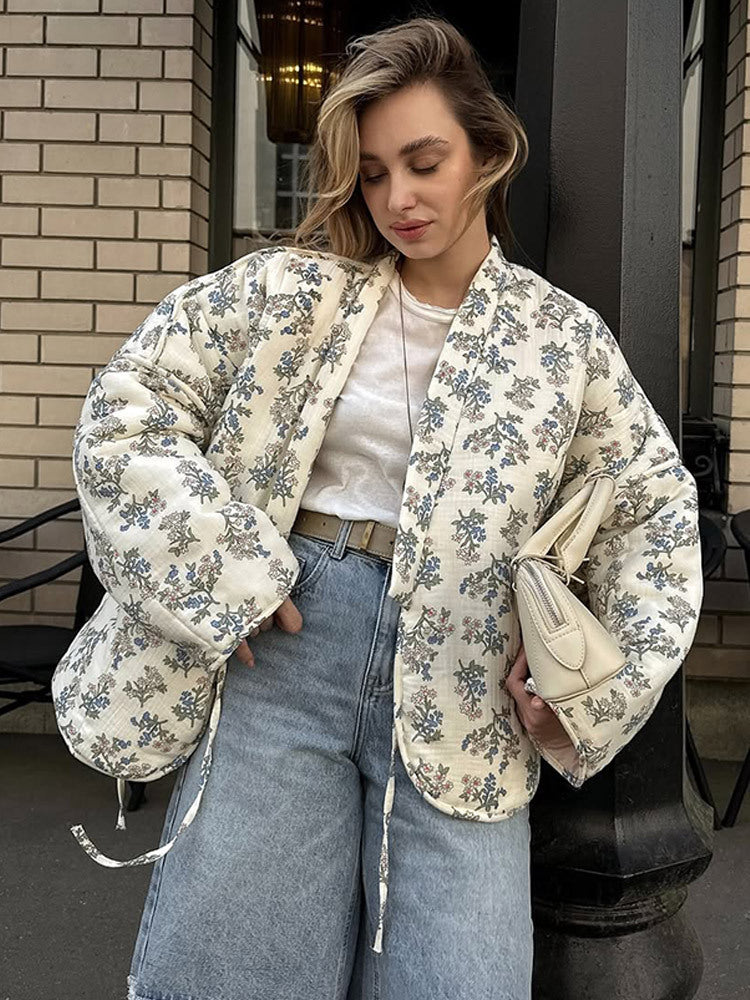 Cardigan matelassé pour dames en jacquard à motif floral Chic und Stil