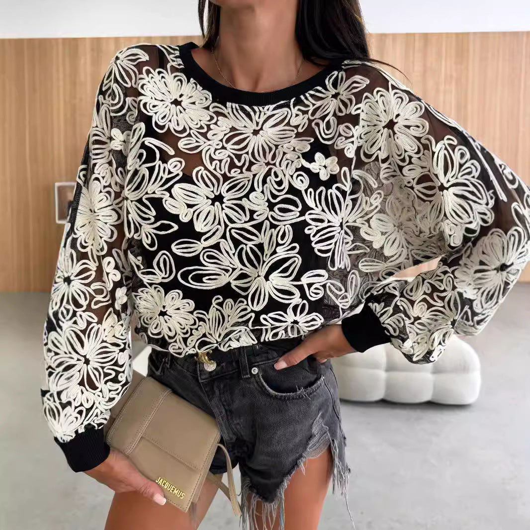 Blouse pour femmes brodée avec des manches transparentes Chic und Stil