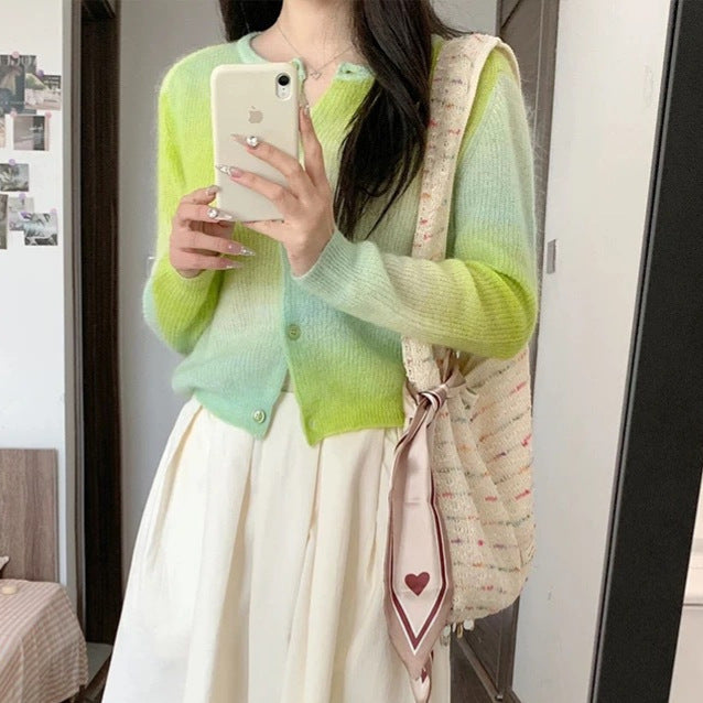 Cardigan pour femmes avec une fine texture ombrée et des boutons pratiques Chic und Stil
