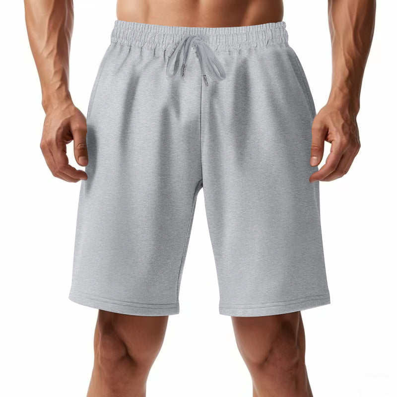 Pantalons de sport respirants pour hommes avec taille élastique et poches latérales Chic und Stil