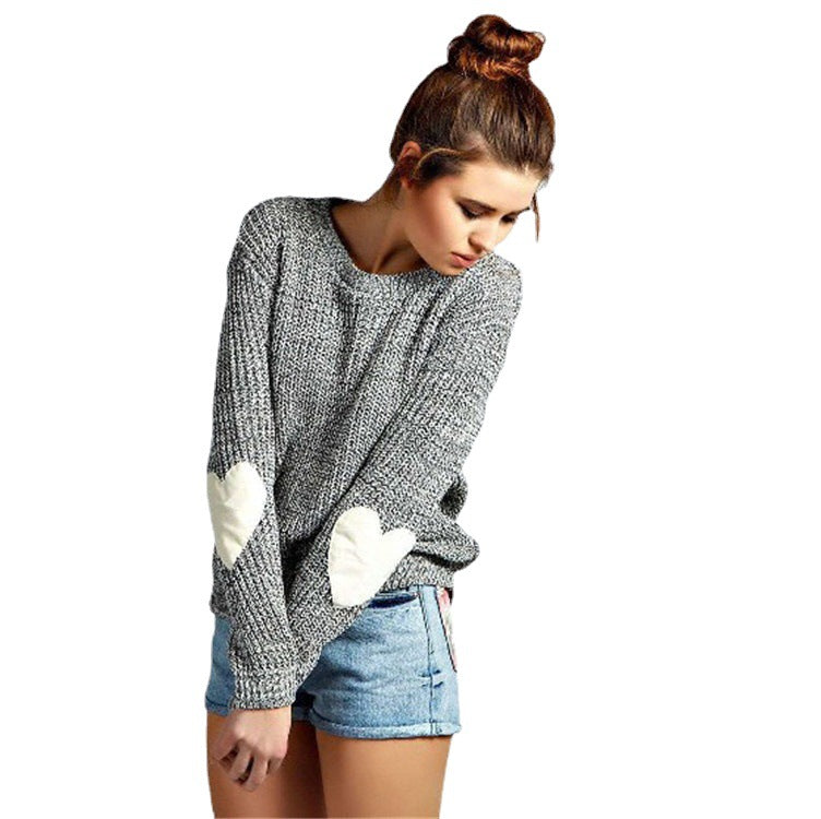 Pull femme avec appliqués en forme de cœur et coupe décontractée Chic und Stil