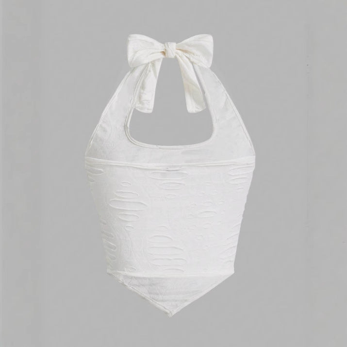 Haut de maillot de bain pour femme à encolure halter avec un détail de nœud ludique et un tissu texturé Chic und Stil