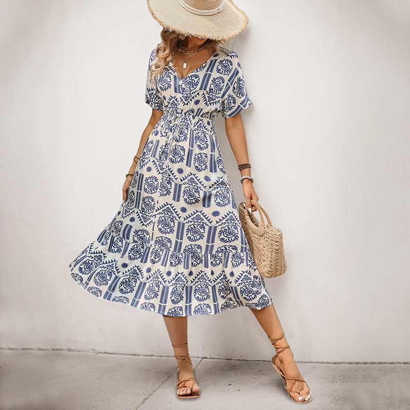 Robe midi femme avec taille à cordon et motif floral Chic und Stil