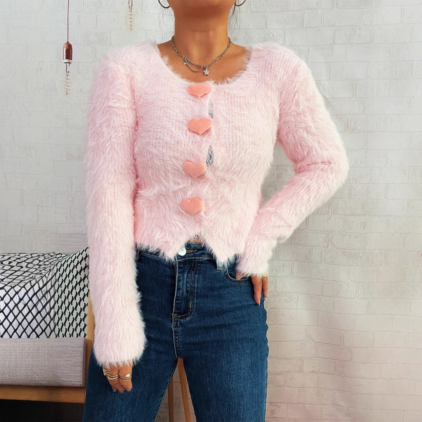 Pull en tricot confortable pour femmes avec boutons en forme de cœur Chic und Stil